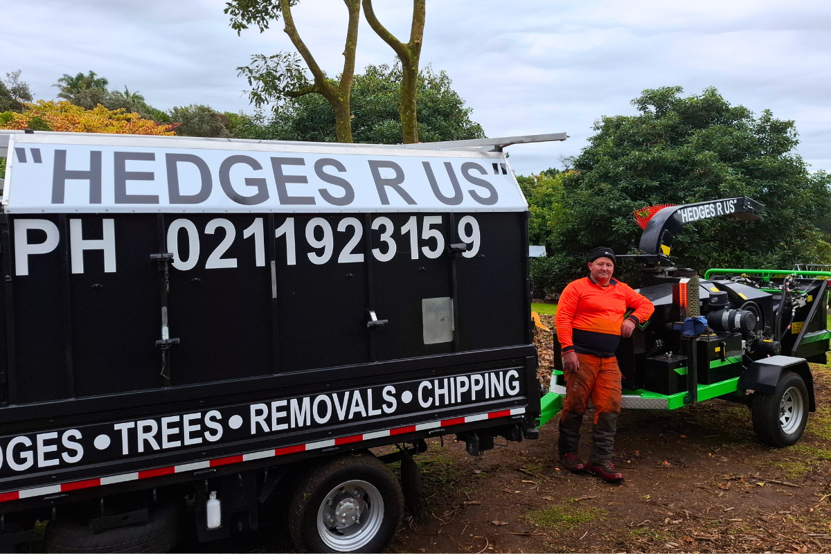 Tauranga hedge trimmer Terry in front of his truck and chipper